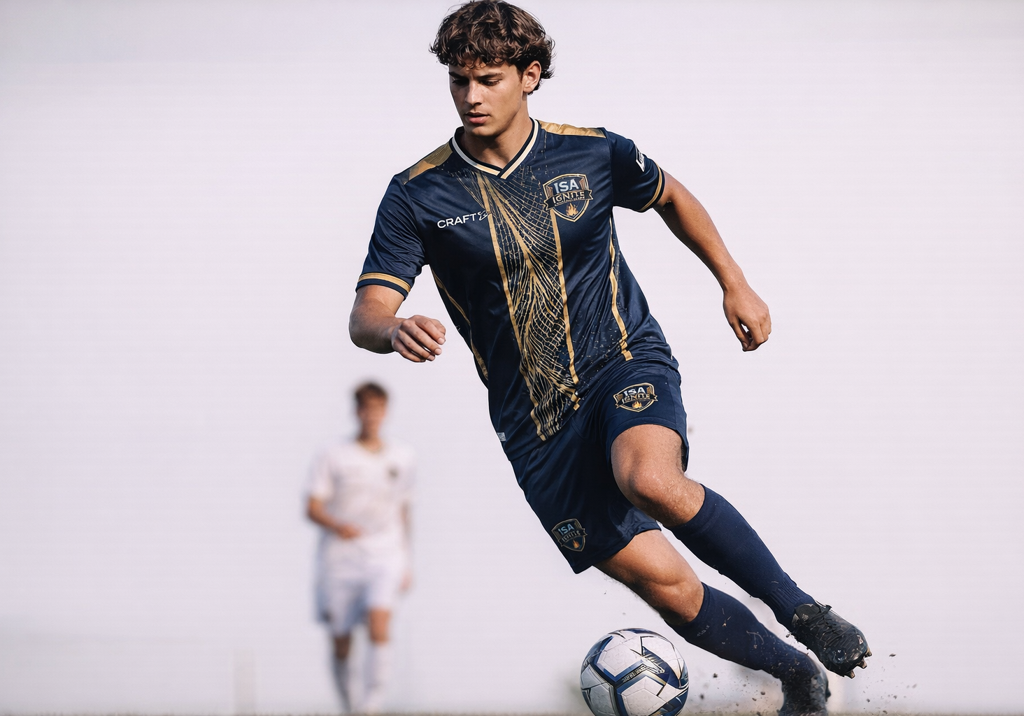 Soccer player in action at sunset